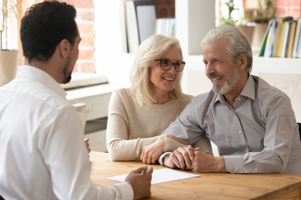 Elder couple consulting with a financial advisor